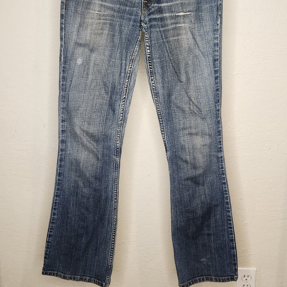 Levi’s 524 Too Superlow Bootcut Jeans – Size 5M – Medium Wash Distressed